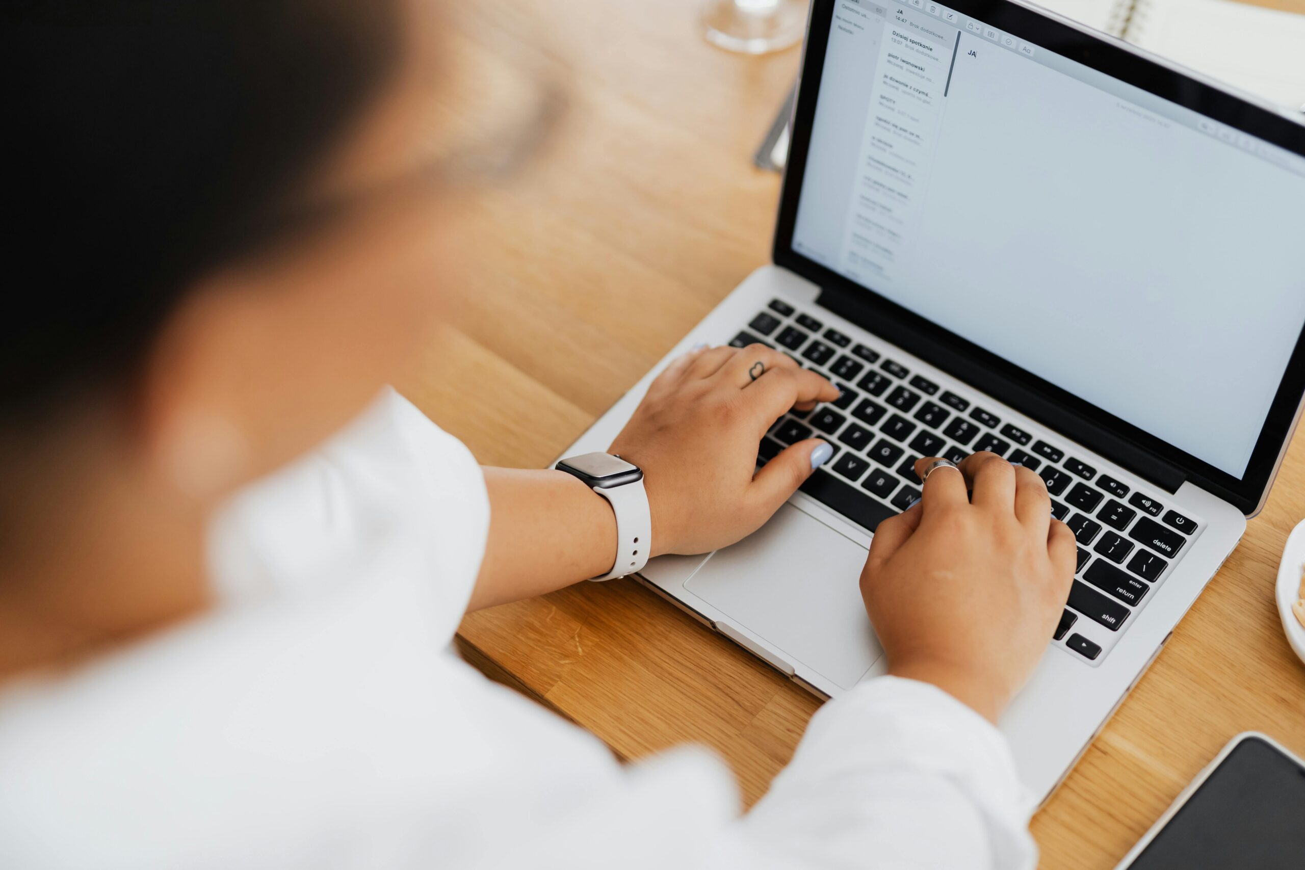 Woman building an email list using laptop for content marketing